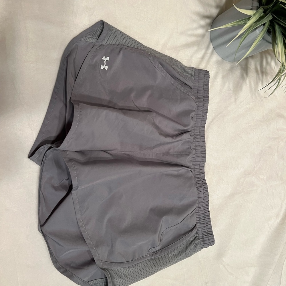Under Armour running shorts with pockets